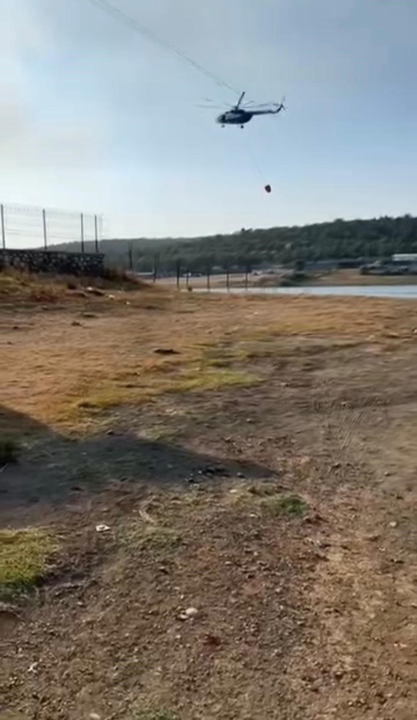 Yangına müdahale eden jandarma pilotundan büyük ustalık 